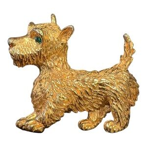A 1948 marked Scottish Terrier Gold tone brooch with Green rhinestone eyes. J24
